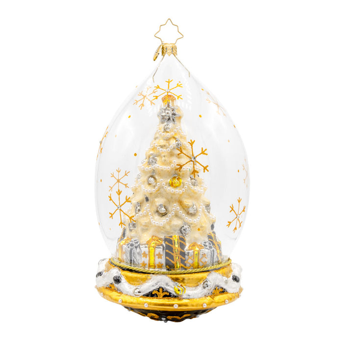 This glass dome ornament captures the essence of Christmas with a beautifully decorated tree, sparkling gifts, and a touch of festive magic. View of back.