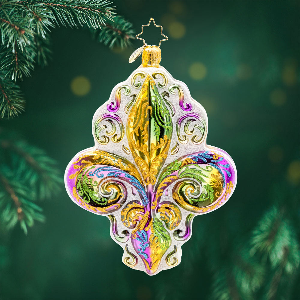 Fleur de Lis Charm Ornament. This Fleur de Lis symbol captures the essence of Mardi Gras with its dazzling design and bold colors. View of front.