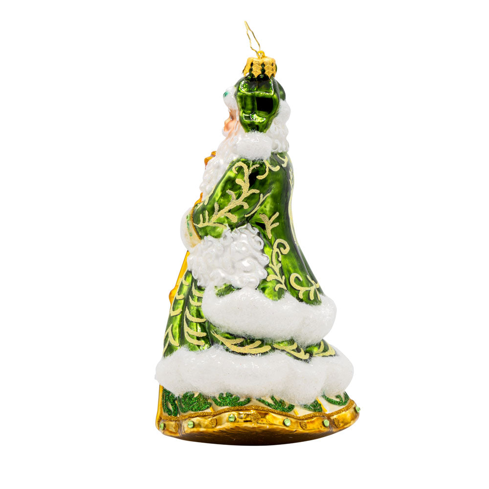 This European-style Santa Claus ornament dons a vibrant green robe, adorned with intricate details and shimmering embellishments. View of right side.