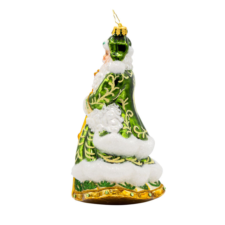 This European-style Santa Claus ornament dons a vibrant green robe, adorned with intricate details and shimmering embellishments. View of right side.