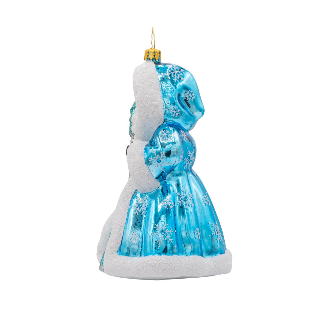 This Santa Claus ornament dons a blue robe, meticulously crafted and adorned with exquisite details. Viewed from right side.