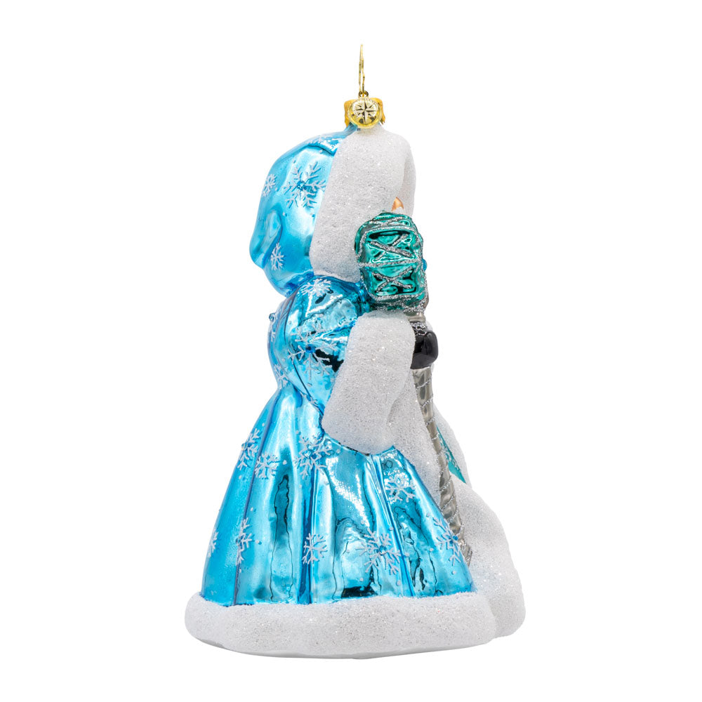 This Santa Claus ornament dons a blue robe, meticulously crafted and adorned with exquisite details. Viewed from left side.