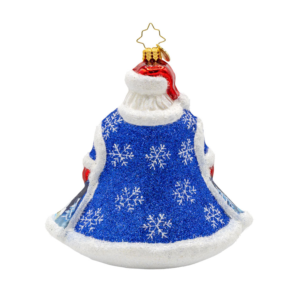 Santa of the Midnight Sky ornament. Santa dons a blue robe with a hand painted scene of him journeying through the night on Christmas Eve. View of back.