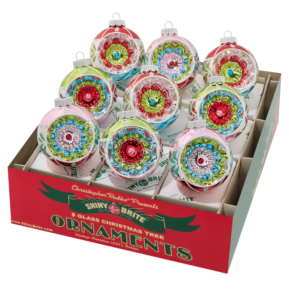 9 count Shiny Brite reflector rounds. Captivating ornaments, with intricate designs and vibrant colors.