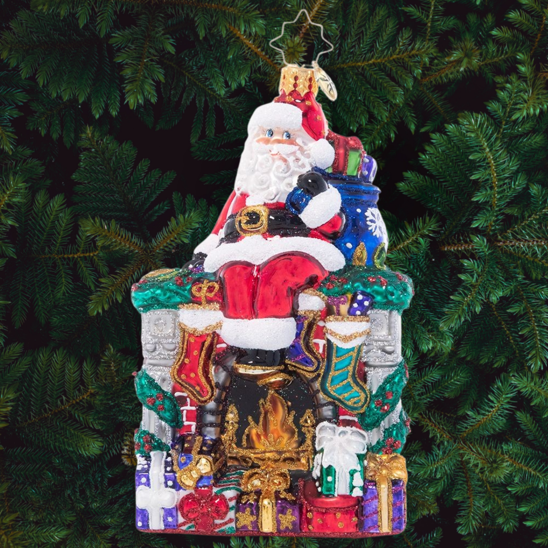 Ornament Description - A Perfect Place to Perch: During a long night of making Christmas magic around the globe, even Santa needs a little break. He finds a spot to sit on the mantle of a roaring fireplace and admires his job well done!