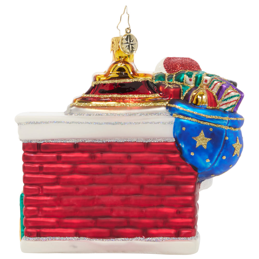 Back - Ornament Description - Nice List Santa: Santa's checked his list twice, and he's decided who has been nice! He's ready to deck the halls and stack this mantle with gifts galore, and the children can't wait to see what's instore.